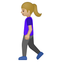 Woman walking medium light skin tone icon