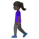 Woman walking dark skin tone icon