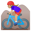 Woman mountain biking medium light skin tone icon
