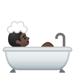 Person taking bath dark skin tone icon