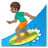 Man surfing medium skin tone icon